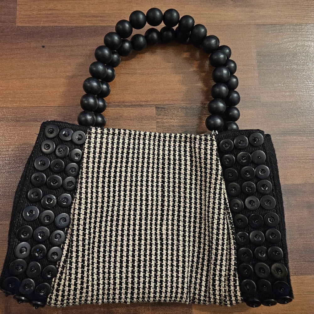 Chic Black and Tan Button-Embellished Mini Bag